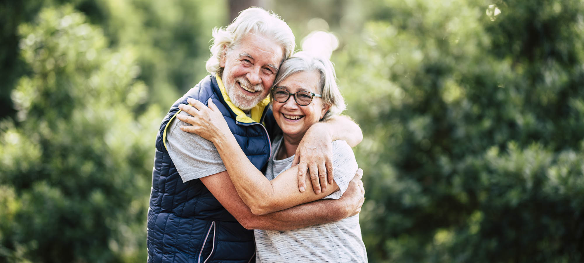 Beautiful elderly lifestyle senior couple hug and stay in love t